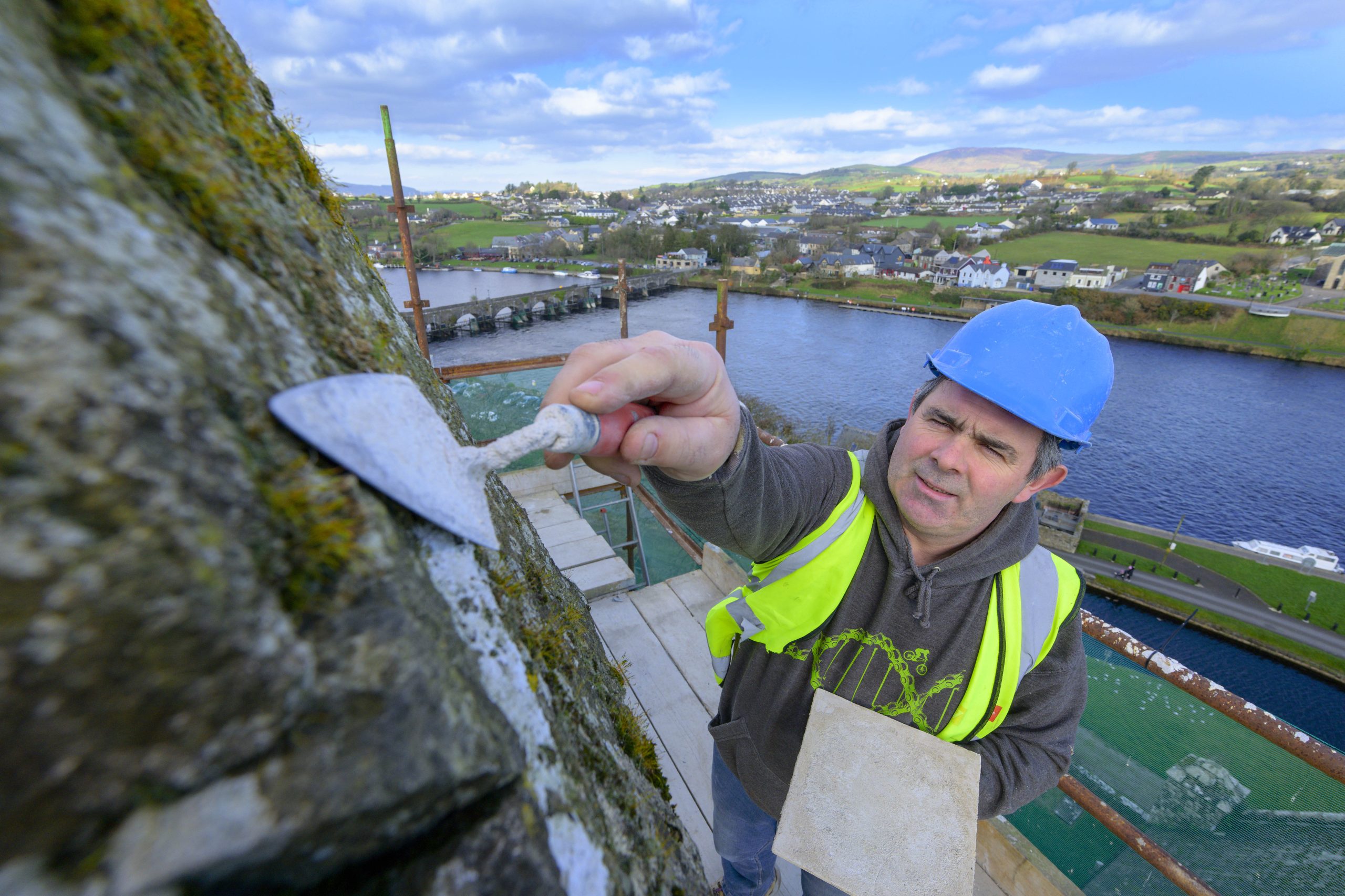 Master stone mason Joe Donegan carrying out restorative work to the bell tower at St Flannan’s Cathedral, Killaloe. Photography by Eugene McCafferty