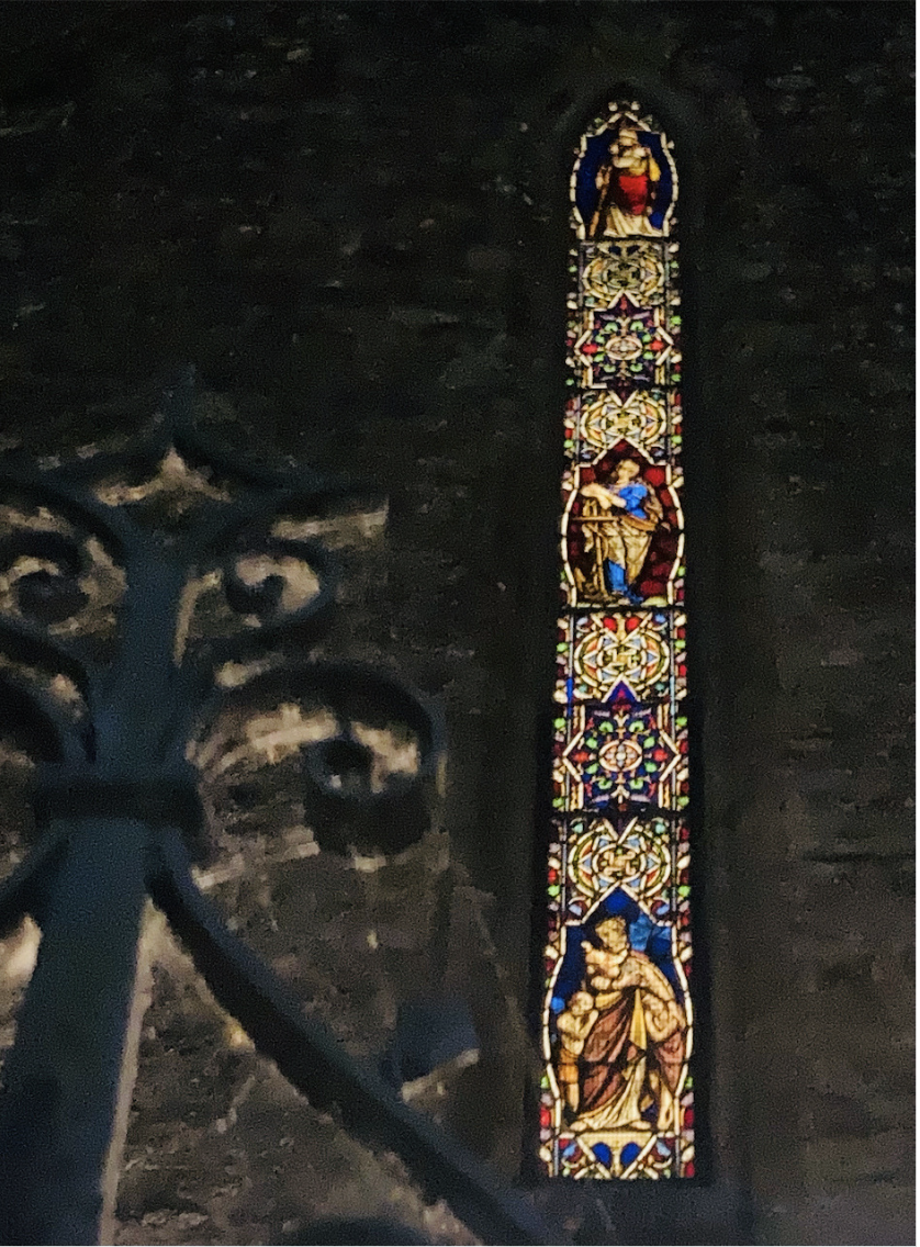 St Flannan's Cathedral West window at night